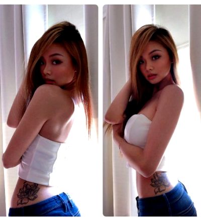 Gorgeous Asian Showing Off Her One Tattoo